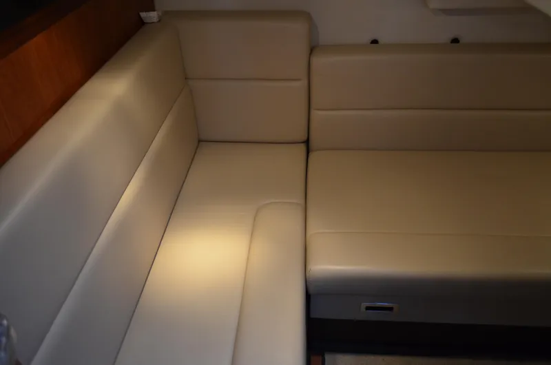 Slide: The Image of 2009 Monterey 320 Sport Yacht interior with beige leather seating. - 37
