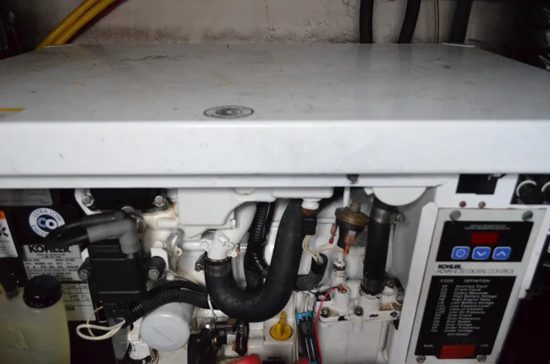 Slide: The Image of Engine compartment of a 2009 Monterey 320 Sport Yacht with Kohler generator. - 44
