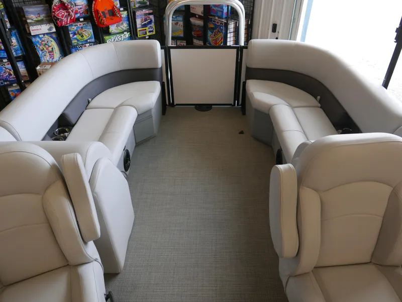 Slide: The Image of 2025 Bentley Pontoons Legacy 223 Navigator interior with plush seating and modern design. - 12