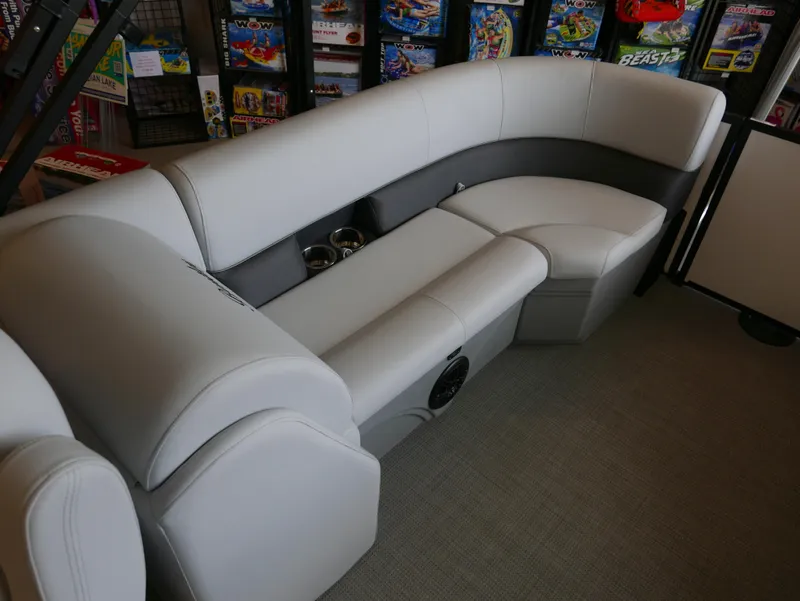 Slide: The Image of 2025 Bentley Pontoons Legacy 223 Navigator interior seating, featuring luxurious gray upholstery. - 14