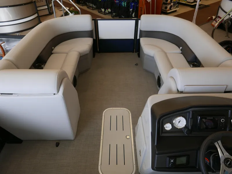 Slide: The Image of 2025 Bentley Pontoons Legacy 223 Navigator interior with plush seating and modern dashboard. - 3