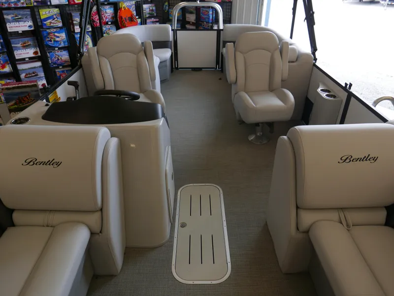 Slide: The Image of Interior of 2025 Bentley Pontoons Legacy 223 Navigator, featuring luxurious seating and modern design. - 6
