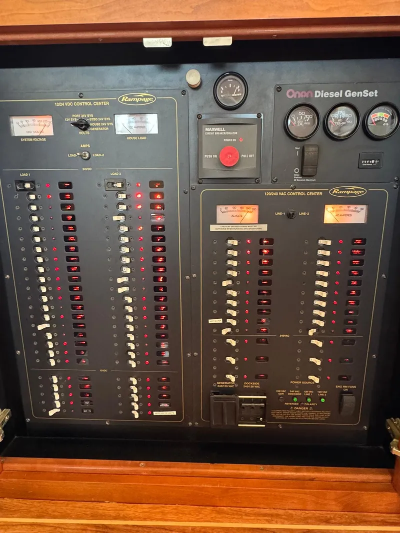 Slide: The Image of Electrical control panel on a 2003 Rampage 45 Convertible boat. - 12