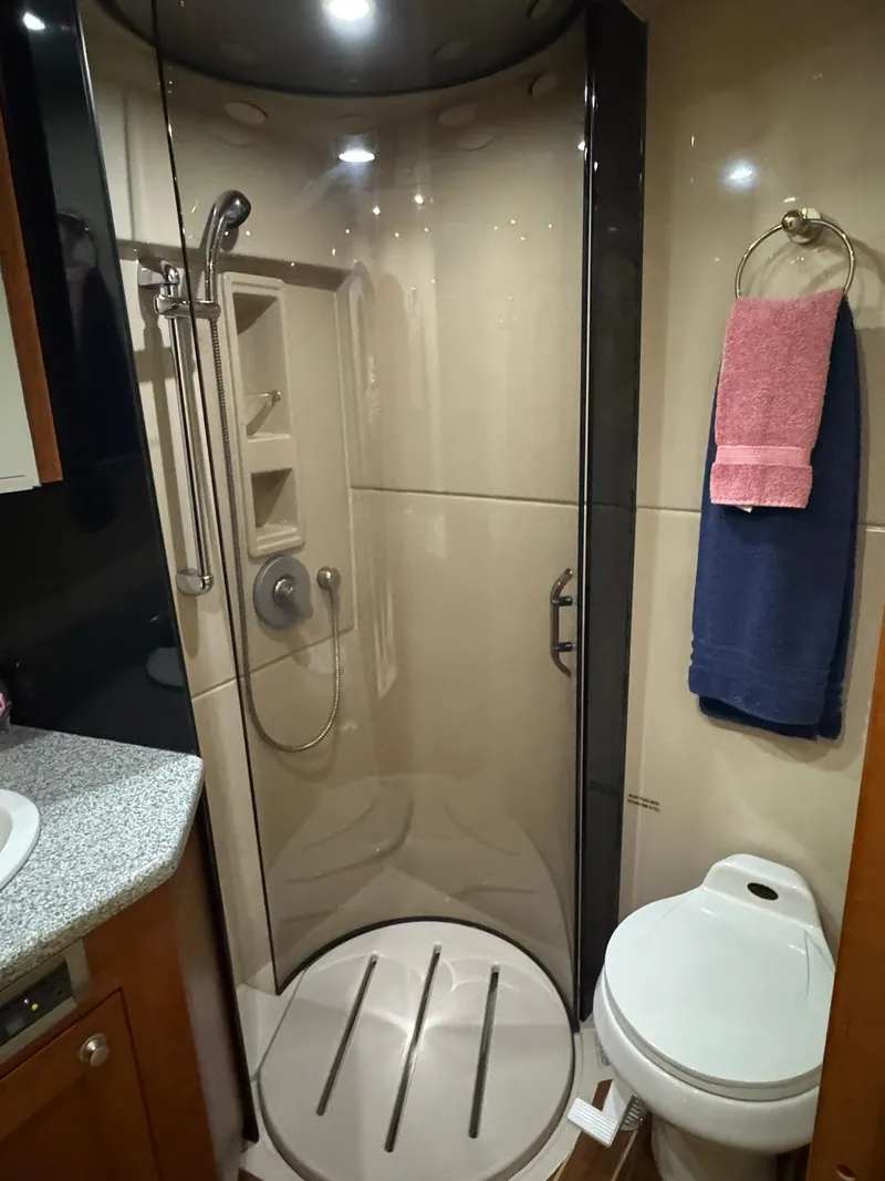 Slide: The Image of Bathroom in 2003 Rampage 45 Convertible yacht with shower and toilet. - 16