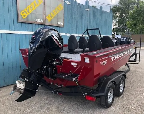 Slide: The Image of 2025 Tracker Targa V-18 Combo boat with Mercury engine, parked at Sizzle Marine. - 2