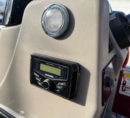 Slide: The Image of 2023 Sun Tracker Bass Buggy 18 DLX dashboard with Kicker stereo system. - 15