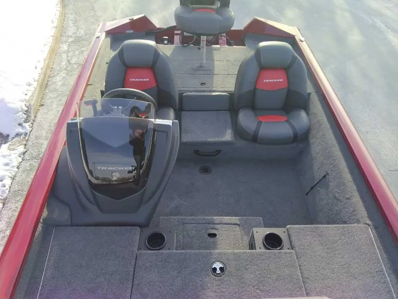 Slide: The Image of 2025 Tracker Pro Team 190 boat interior with dual seats and steering console. - 3