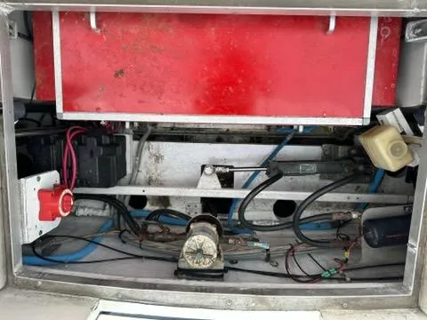 Slide: The Image of Engine compartment of 1986 C. Raymond Hunt Design Yacht, showing wiring and components. - 44