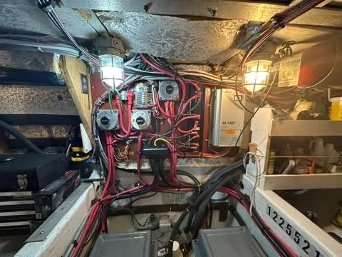 Slide: The Image of Engine room of 1986 C. Raymond Hunt Design Yacht with wiring and equipment. - 49