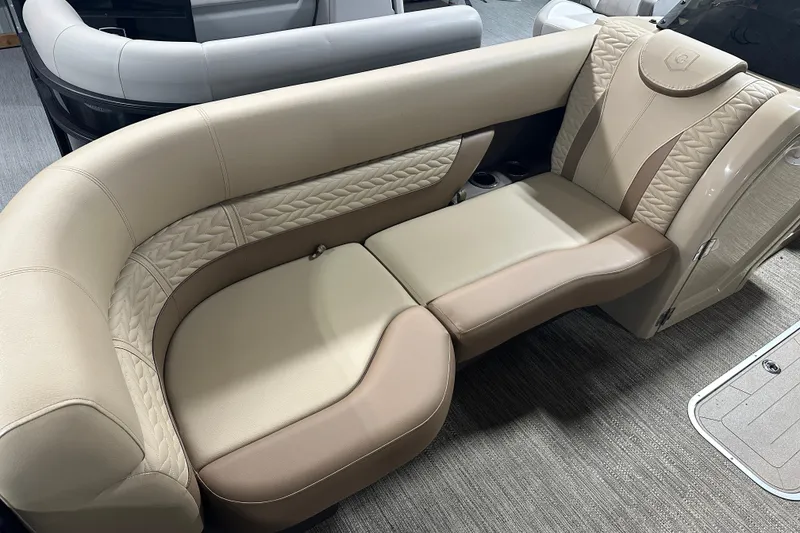 Slide: The Image of Luxurious seating on 2025 Godfrey MONACO 235 SFL boat, featuring elegant beige upholstery. - 5