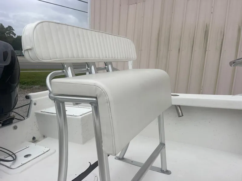 Slide: The Image of White seating on 2021 May-Craft 19 Cape Classic boat, featuring sleek design and sturdy construction. - 13