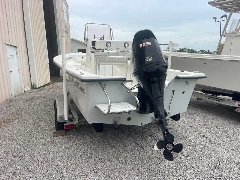 Slide: The Image of 2021 May-Craft 19 Cape Classic boat with 115 HP outboard motor on gravel. - 7