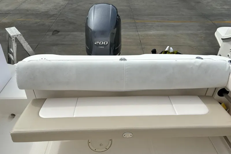 Slide: The Image of 2016 Robalo R222 Center Console boat with Yamaha 200 engine, rear seating view. - 13