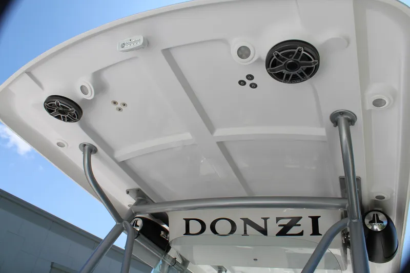 Slide: The Image of 2009 Donzi 35 ZFX Cuddy boat roof with speakers and support poles. - 24