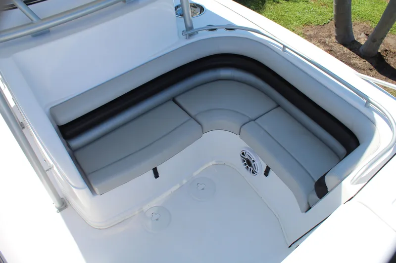 Slide: The Image of 2009 Donzi 35 ZFX Cuddy boat interior with cushioned seating. - 28