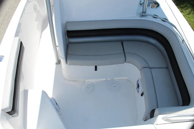 Slide: The Image of 2009 Donzi 35 ZFX Cuddy boat interior with cushioned seating area. - 29