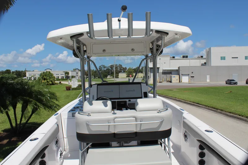 Slide: The Image of 2009 Donzi 35 ZFX Cuddy boat with T-top and dual consoles. - 33