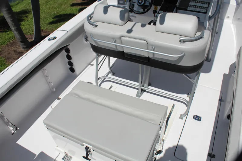 Slide: The Image of 2009 Donzi 35 ZFX Cuddy boat interior with seating and console. - 42
