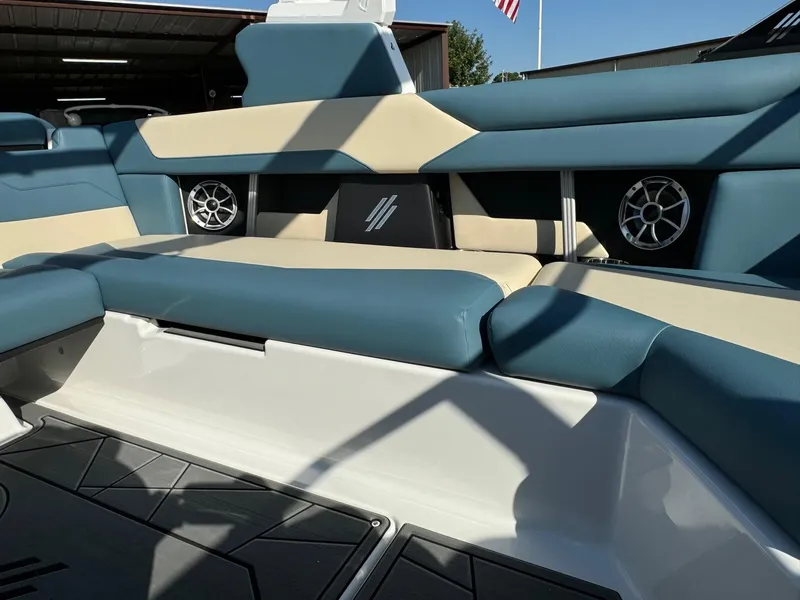Slide: The Image of Interior of 2025 ATX Surf Boats 22 Type-S with blue and beige seating. - 8