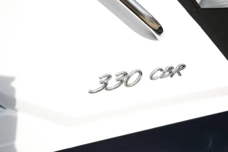 Slide: The Image of 2025 Formula 330 CBR logo on white surface, close-up view. - 10