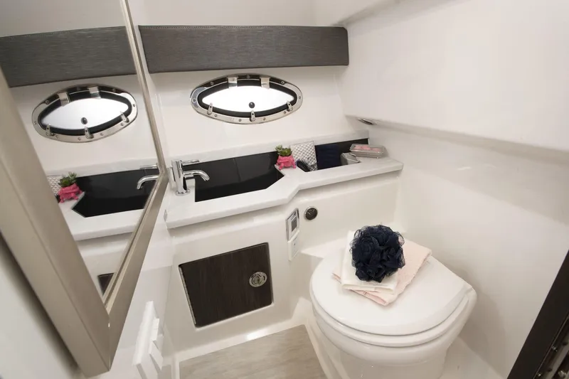 Slide: The Image of Luxurious bathroom interior of 2025 Formula 330 CBR boat with modern fixtures and decor. - 46