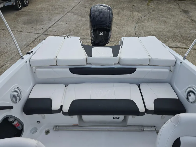 Slide: The Image of 2021 Tahoe 450 TF boat interior with white and black seating. - 14