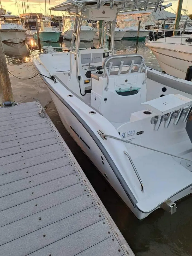 Slide: The Image of 2020 Cape Horn 22 OS boat docked at marina during sunset. - 4