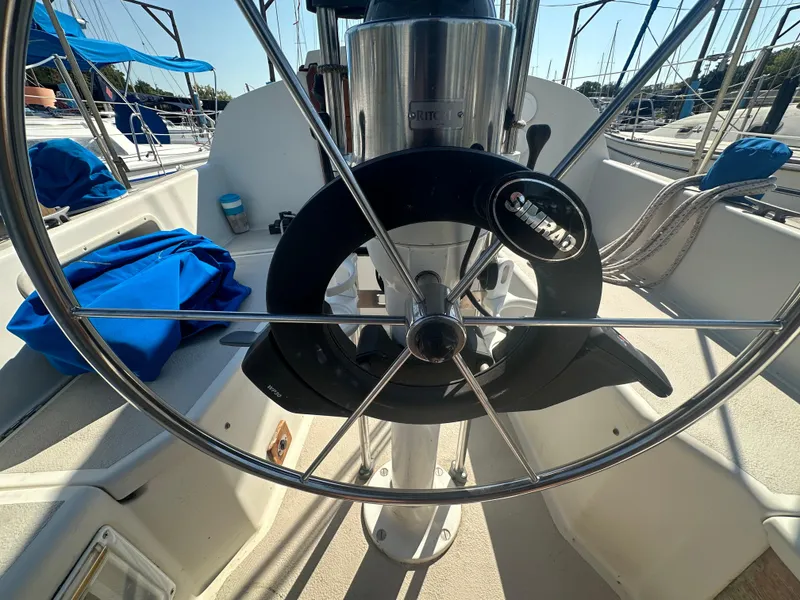 Slide: The Image of Steering wheel of 1983 O'Day 28 sailboat with Simrad autopilot. - 7