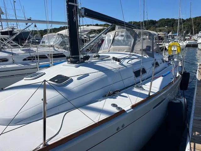 Slide: The Image of 2007 Beneteau First 36.7 sailboat docked at marina, featuring sleek design and modern rigging. - 9
