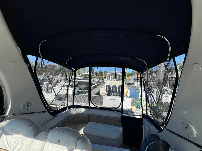Slide: The Image of Interior view of 2007 Four Winns 318 Vista boat with canopy and seating. - 7