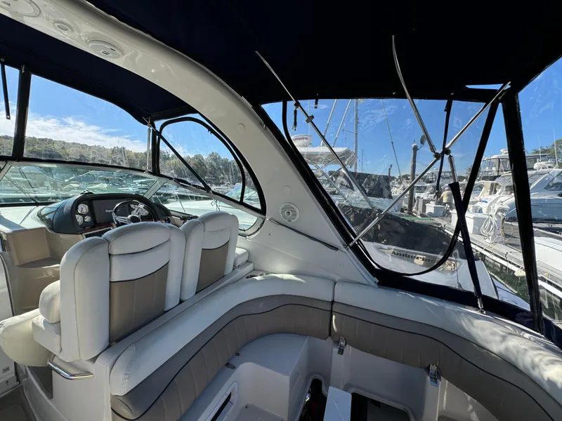 Slide: The Image of Interior view of 2007 Four Winns 318 Vista yacht with seating and helm. - 9