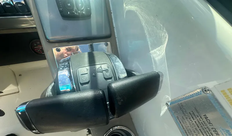 Slide: The Image of Close-up of 2015 Formula 310 Bowrider boat controls and dashboard. - 14