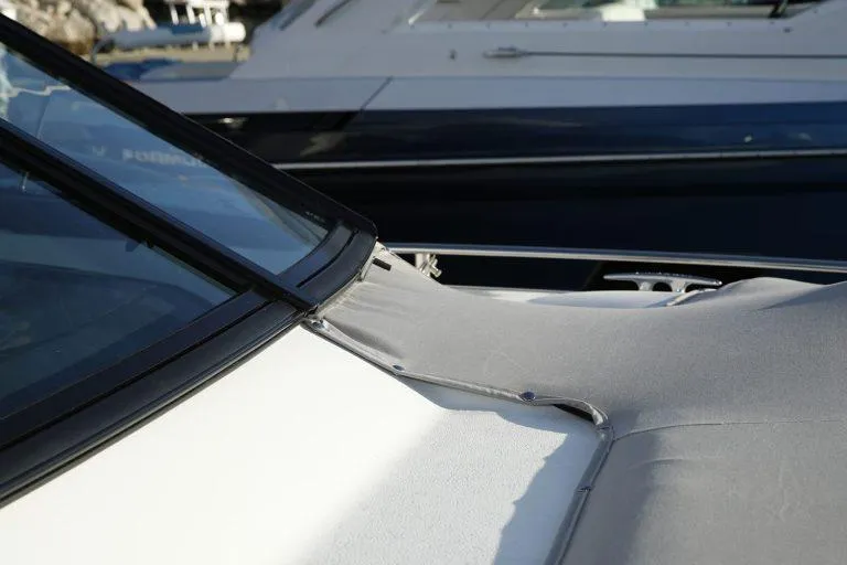 Slide: The Image of 2025 Formula 350 CBR boat with sleek design and covered deck. - 10