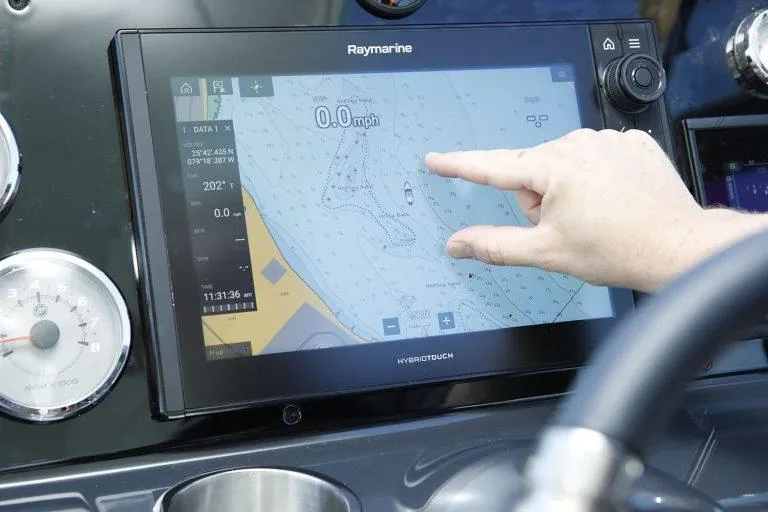 Slide: The Image of Touchscreen navigation on 2025 Formula 350 CBR boat dashboard, displaying nautical map. - 15