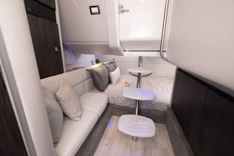 Slide: The Image of Interior of 2025 Formula 350 CBR boat, featuring cozy seating and modern design. - 49