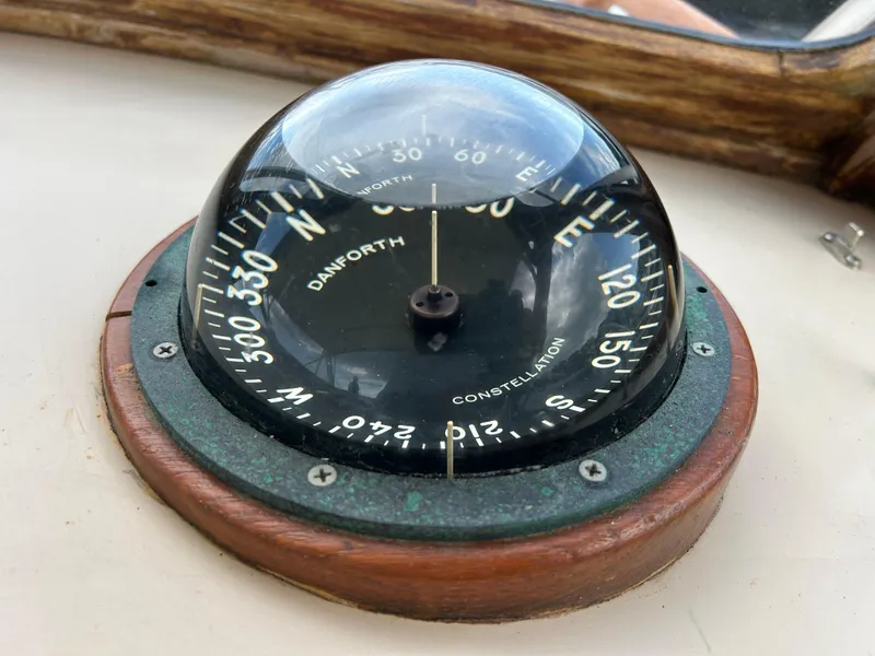 Slide: The Image of Vintage Danforth compass on 1983 Fortier 26 boat dashboard. - 22