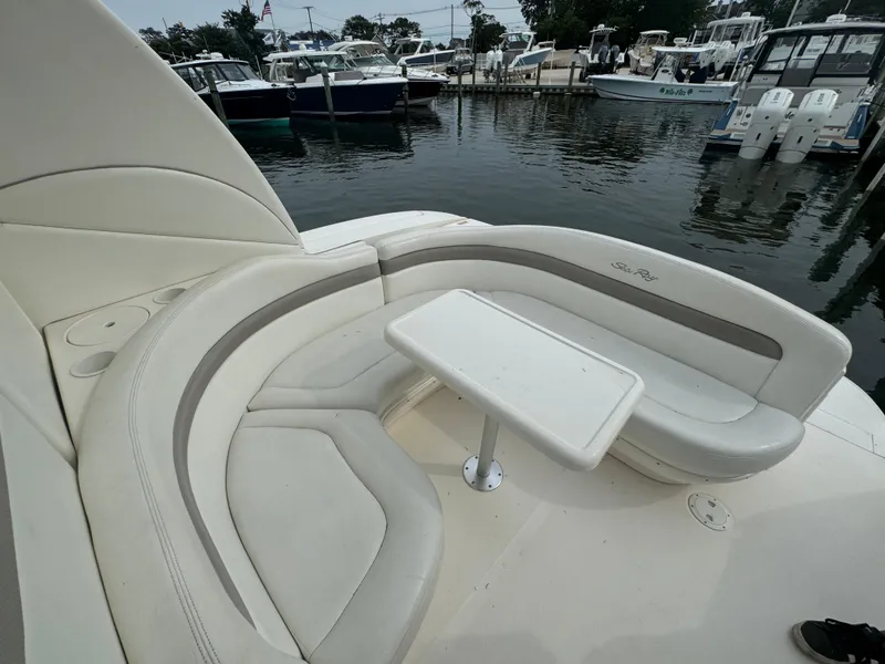 Slide: The Image of Luxurious seating area on 2003 Sea Ray 320 Sundancer yacht at marina. - 20