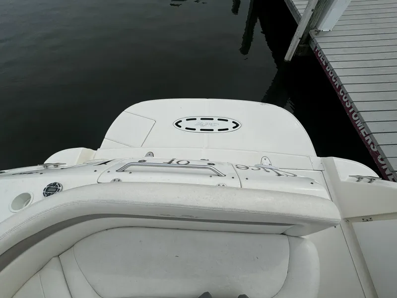 Slide: The Image of 2003 Sea Ray 320 Sundancer boat at dock, rear view. - 21