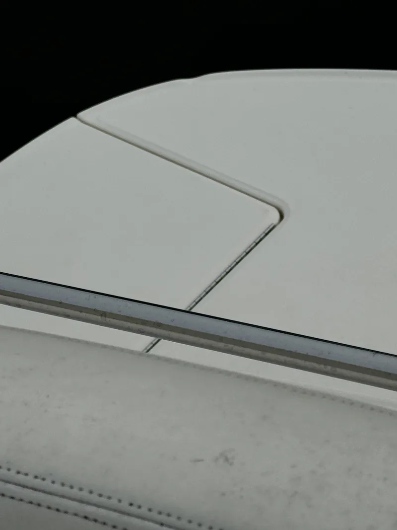 Slide: The Image of Close-up of 2003 Sea Ray 320 Sundancer boat seating and railing. - 31