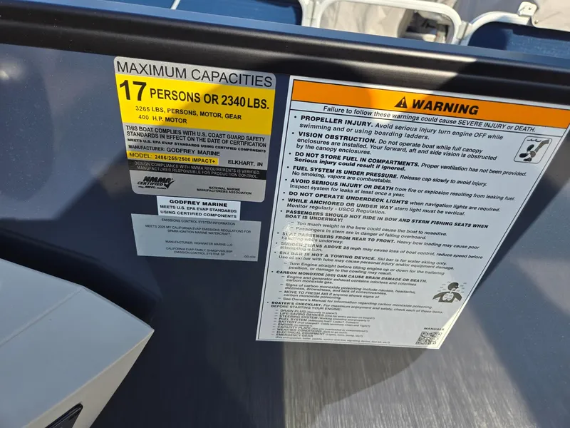 Slide: The Image of Capacity and warning labels on 2025 Godfrey SWEETWATER Entertainment 2486 DT boat. - 20