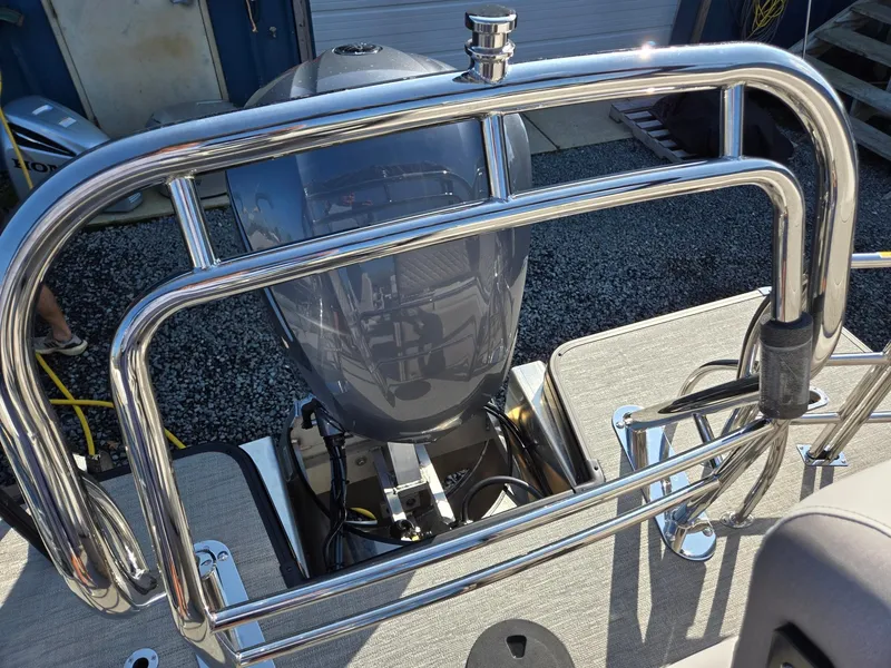 Slide: The Image of 2025 Godfrey SWEETWATER Entertainment 2486 DT boat engine with chrome railing. - 30