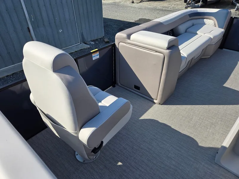 Slide: The Image of 2025 Godfrey SWEETWATER Entertainment 2486 DT pontoon boat interior with plush seating. - 35