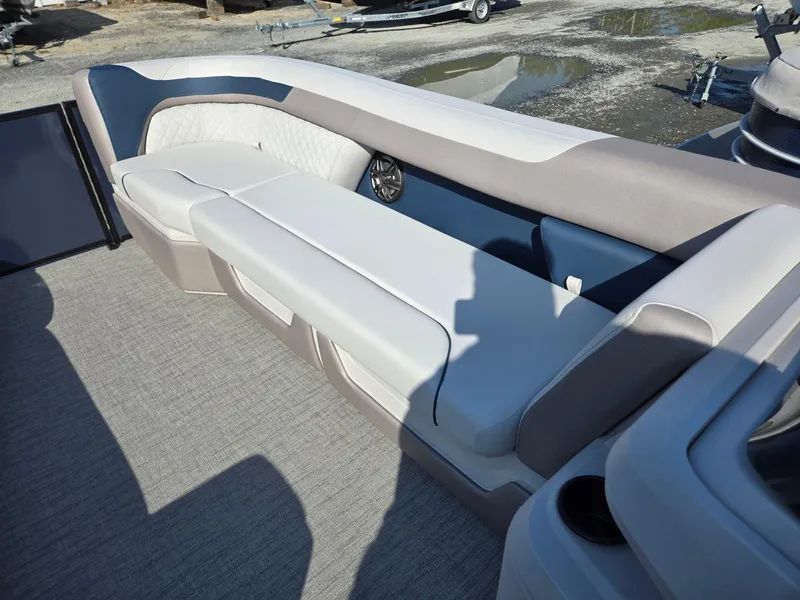 Slide: The Image of 2025 Godfrey SWEETWATER Entertainment 2486 DT boat interior with cushioned seating. - 37