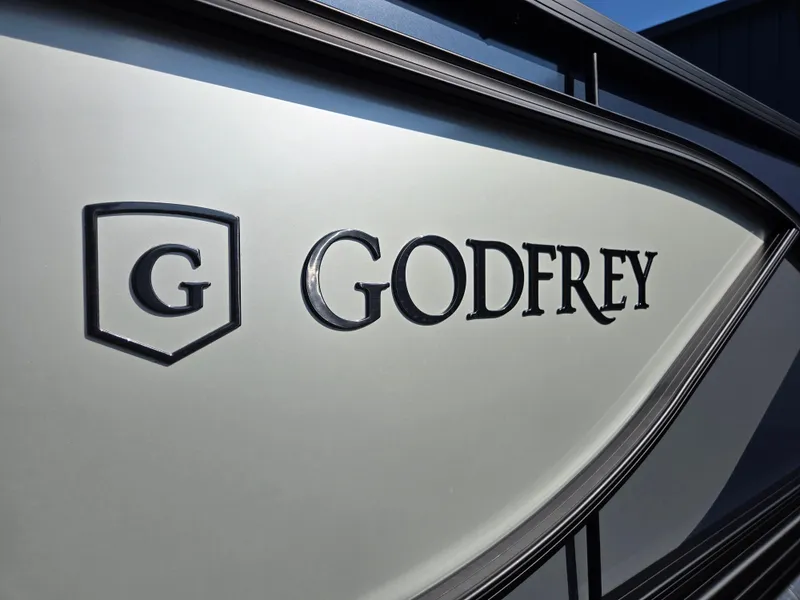 Slide: The Image of Close-up of 2025 Godfrey SWEETWATER Entertainment 2486 DT boat logo. - 41