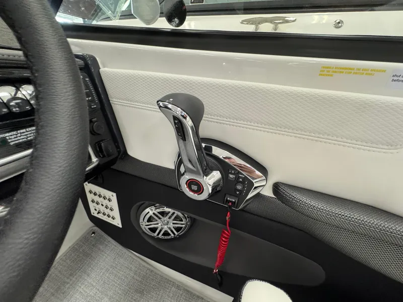 Slide: The Image of Interior of 2025 Formula 240 BR boat, featuring control panel and speaker system. - 15