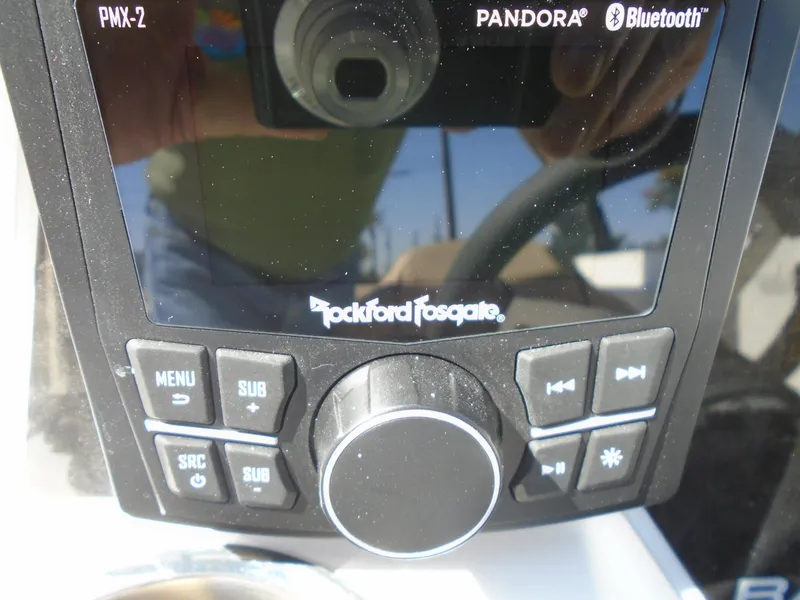 Slide: The Image of Rockford Fosgate audio system in 2025 Bayliner D22I boat, featuring Bluetooth and Pandora connectivity. - 13