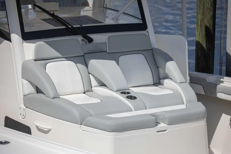 Slide: The Image of 2021 Regulator 41 boat seating with gray and white upholstery. - 17