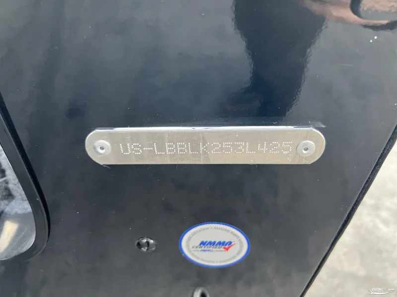 Slide: The Image of 2025 Lund 1675 Adventure Sport boat identification plate with NMMA certification sticker. - 22
