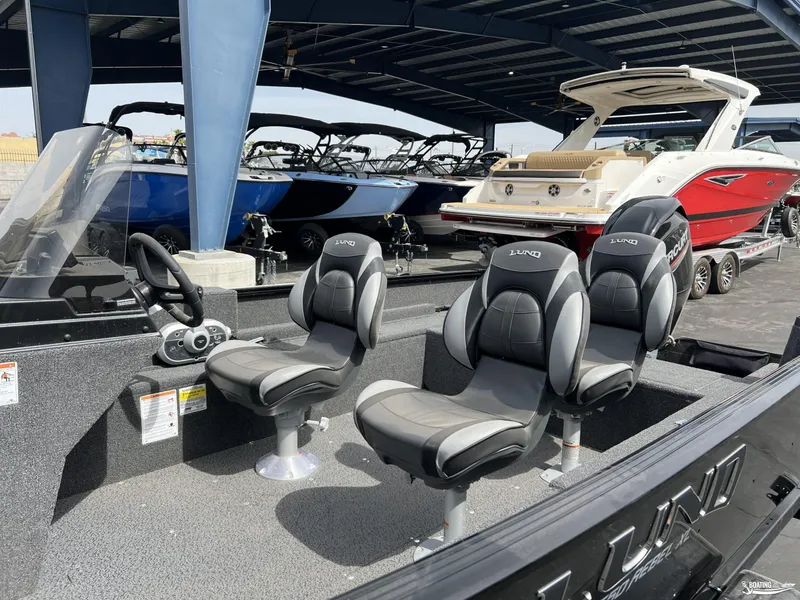Slide: The Image of 2025 Lund 1650 Rebel XL Blackout Package boat with sleek seating and modern design. - 3