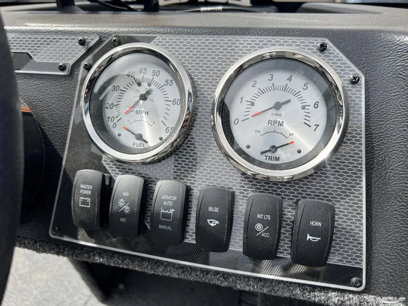 Slide: The Image of Dashboard of 2025 Lund 1650 Rebel XL Blackout Package with gauges and switches. - 8